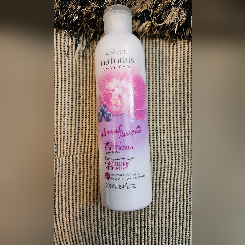 Avon Naturals body lotion 8.4 fl.oz.Orchard and Blueberry Please go to my pag
